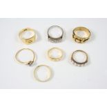 A DIAMOND FIVE STONE RING set with five circular-cut diamonds, size N, an 18ct. gold ring, set