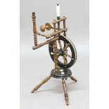 TURNED WOOD SPINNING WHEEL, the ebonised wheel with turned spokes, the whole with ivory