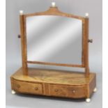 SHERITAN STYLE MAHOGANY AND INLAID TOILET MIRROR, the arched plate on a bowfronted base with a