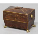 REGENCY MAHOGANY AND BOXWOOD INLAID TEA CADDY, of sarcophagus form with twin canister interior,