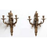 PAIR OF GILT BRASS THREE BRANCH WALL LIGHTS, late 19th century, the sconces with foliate drip