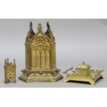 VICTORIAN GILT METAL STAND, of gothic, triangular form, in the manner of Pugin, height 33cm;