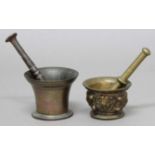 BRONZE PESTLE AND MORTAR 18th century, the mortar decorated with masks, height 8cm, pestle length
