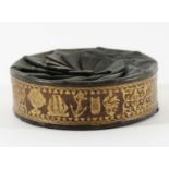 GEORGE III LEATHER STUD BOX with folding leather top and scrolling gilt embossed border depicting