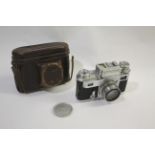 ZEISS IKON CONTAX CAMERA & LEATHER CASE a Contax camera with built in light meter and shutter speeds