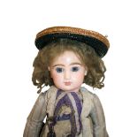 JUMEAU FRENCH DOLL - CLOSED MOUTH the doll with fixed blue glass paperweight eyes, closed mouth