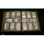 ALBUMS OF CIGARETTE CARDS a mixed lot including John Player Footballers Caricatures, Wills Roses,