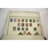 STAMP ALBUM the album with some early classic stamps in mixed condition including GB 1d black,