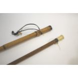 WALKING STICKS including an ivory top walking stick with a malacca shaft, and a bamboo shafted stick