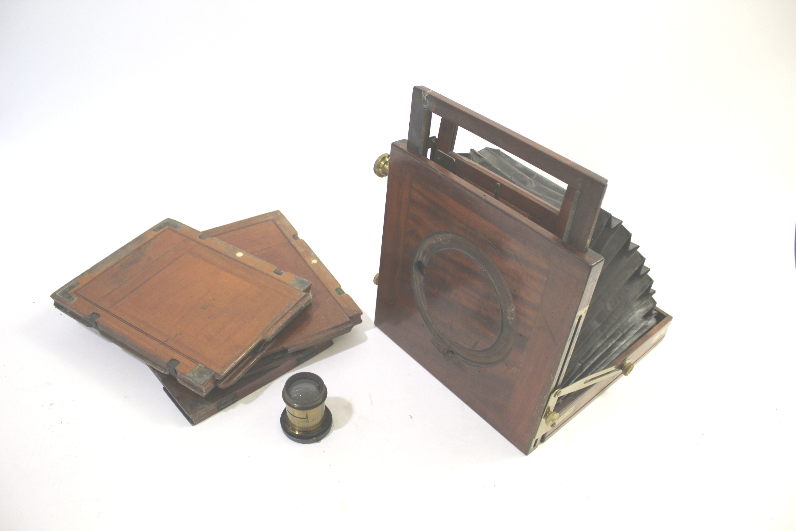 PLATE CAMERA a mahogany plate camera with a Busch's Rapid No 3 brass lens, and with some wooden