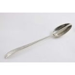A GEORGE III IRISH BRIGHT-CUT AND STAR STRAINER SPOON of basting size, with a slot-pierced