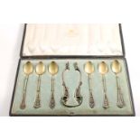 AN EARLY 20TH CENTURY NORWEGIAN CASED SET OF SIX SILVERGILT COFFEE SPOONS and a pair of matching