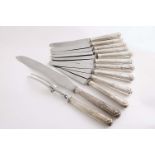 A SET OF TEN GEORGE III IRISH TABLE KNIVES King's pattern (with later, stainless steel blades) and a