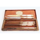 AN EARLY 19TH CENTURY FRENCH CASED, PART-SET, KNIVES silvergilt mounted, mother of pearl handled