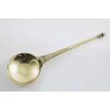 A LATE 17TH CENTURY DUTCH SILVERGILT SPOON with a tapering, a round bowl & a bud finial, engraved on