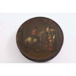 A 19TH CENTURY LACQUERED PAPIER-MACHE CIRCULAR BOX painted on the cover with figures and a