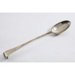 A LATE GEORGE II IRISH HOOK-END BASTING SPOON crested, by Christopher Skinner, Dublin 1759; 11.5" (
