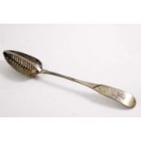 A GEORGE III IRISH FIDDLE PATTERN STRAINER SPOON of basting size, with slot-pierced divider, crested