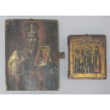 TWO RUSSIAN ICONS, the first of a patriarch, oil on panel, 29.5cm x 22cm; the second of a winged