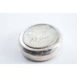 A GEORGE III SILVER & MOTHER OF PEARL SNUFF OR TOBACCO BOX plain circular with reeded borders, the