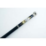 A LATE 19TH / EARLY 20TH CENTURY AMERICAN WALKING CANE with a silver-mounted porcelain handle, an