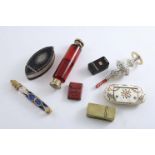 A MIXED LOT:- A Victorian silvergilt mounted, double-ended red glass scent bottle, a "penny