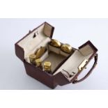 AN EARLY 20TH CENTURY MINIATURE TOILET CASE with six silvergilt fittings (a compact, two boxes,