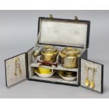 TRAVELLING ELECTRO PLATED TEA SET, retailed by Maquer, Paris and Nice, in a leather bound case,