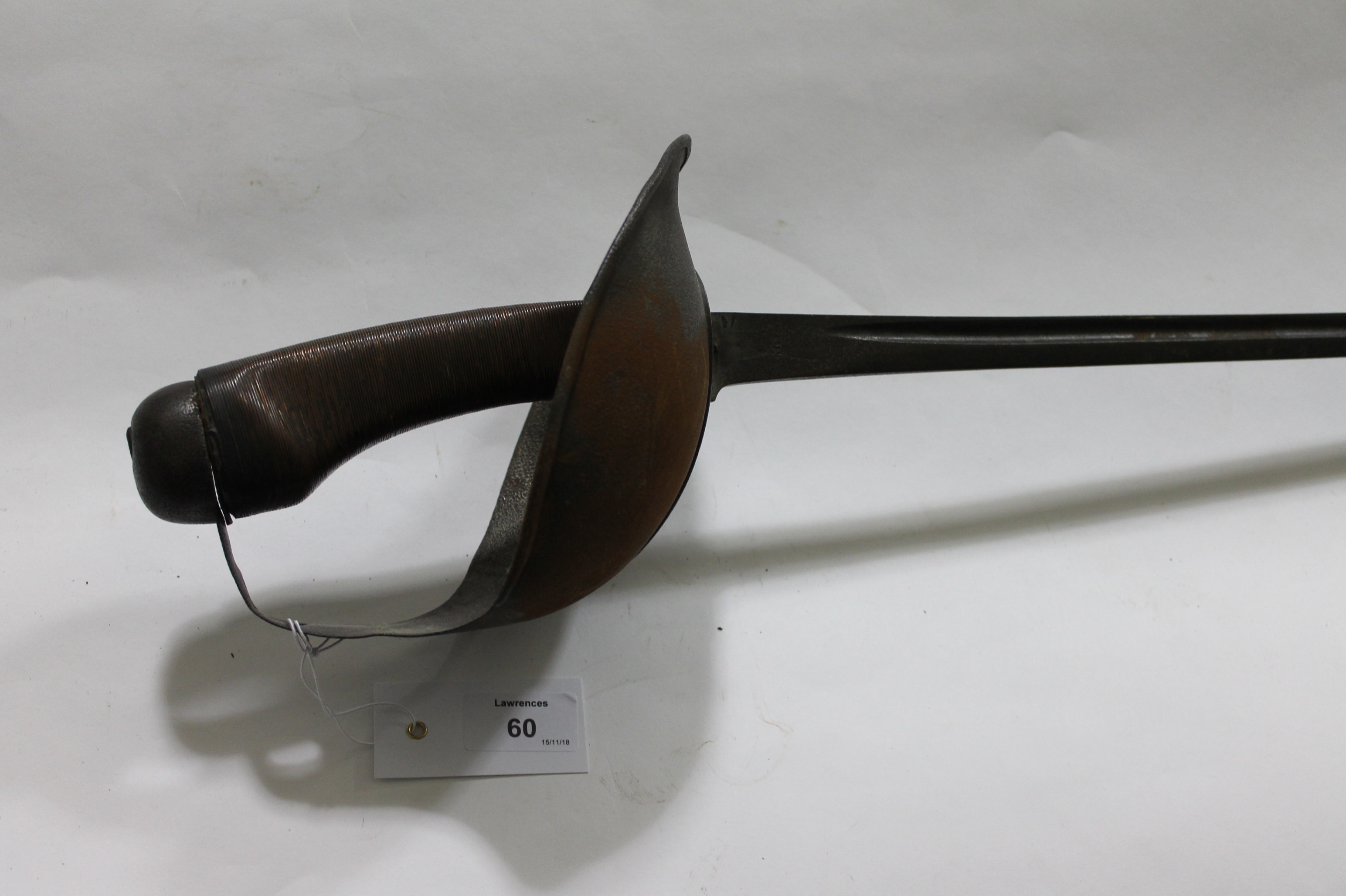 A CAVALRY SWORD. A 1908 pattern troopers issue cavalry sword, with rust evident to both the 35"