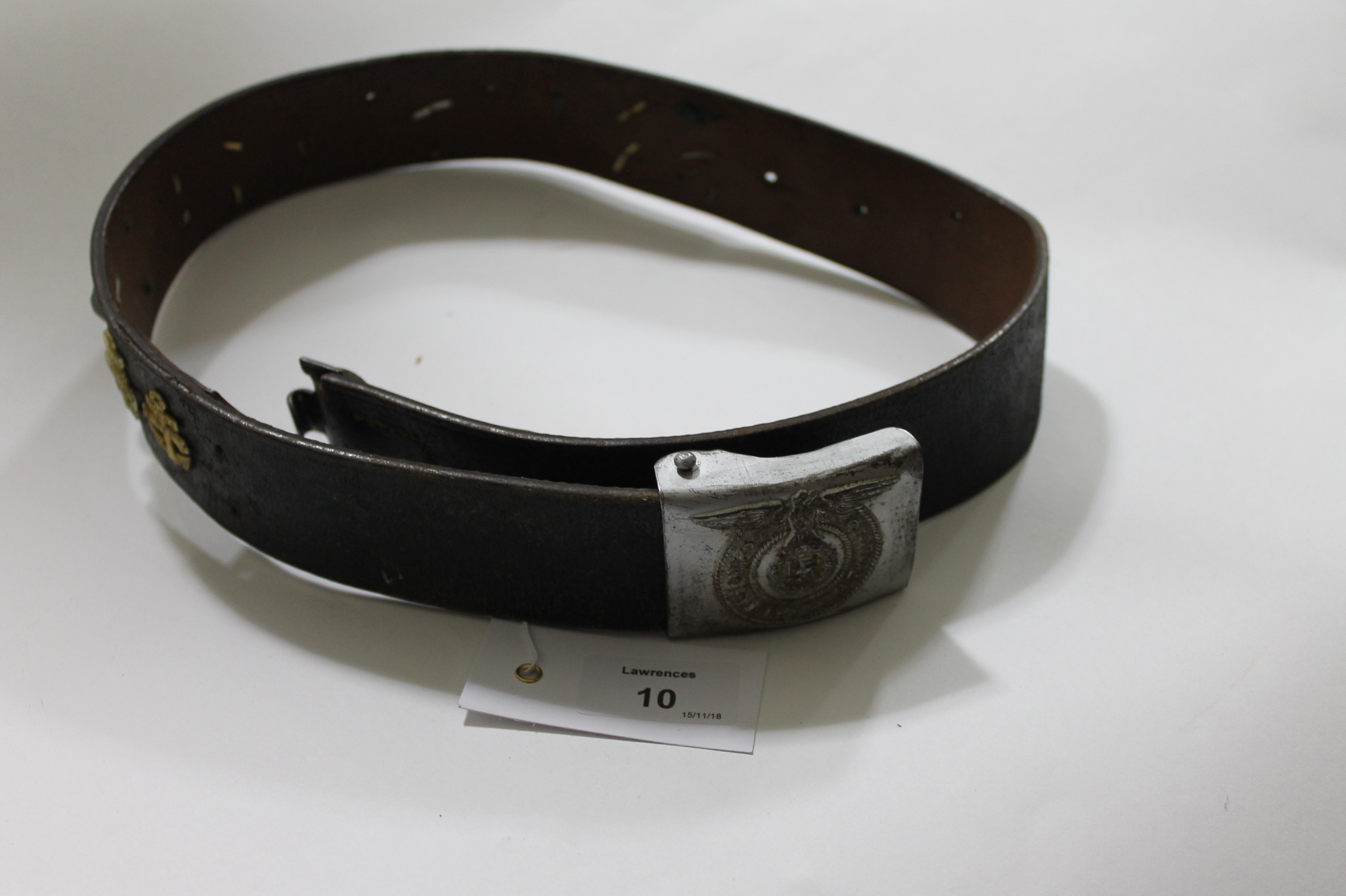 A GERMAN W W 11 PERIOD BELT. Complete with its SS insignia silver washed buckle, and original