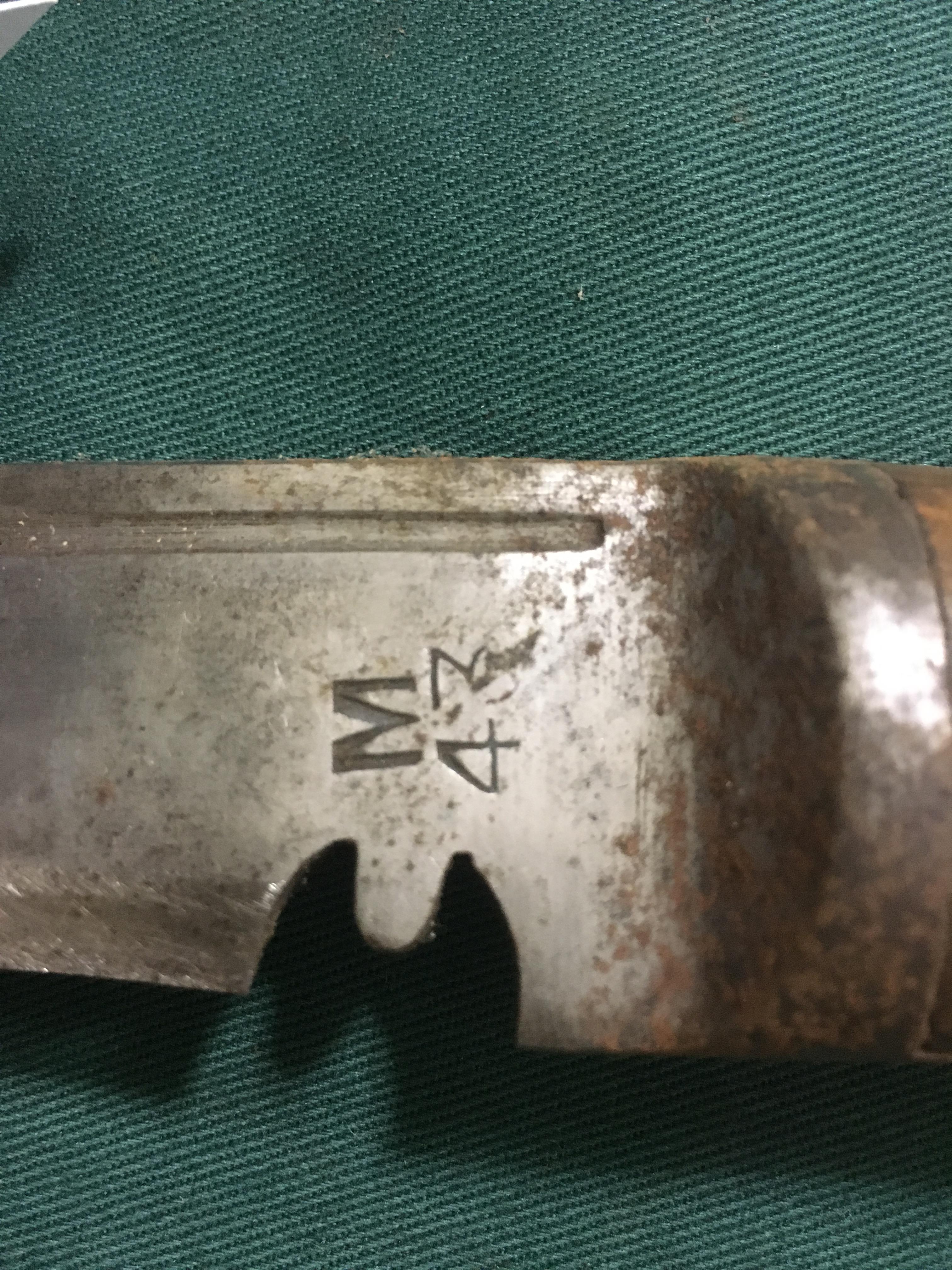 A MILITARY KUKHRI. A WW11 period military issue Kukhri, complete with its scabbard and solitary - Image 5 of 5