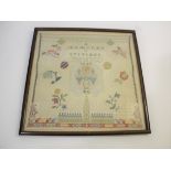 FRAMED SAMPLER - A SAMPLER OF STITCHES, 1932. a framed sampler titled A Sampler of Stitches,