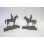 PAIR OF BRASS MILITARY DOOR STOPS - BOER WAR INTEREST a pair of brass doorstops, each with a Boer