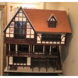 TUDOR STYLE MODERN DOLLS HOUSE & CONTENTS a modern 3 storey wooden dolls house in the Tudor style,