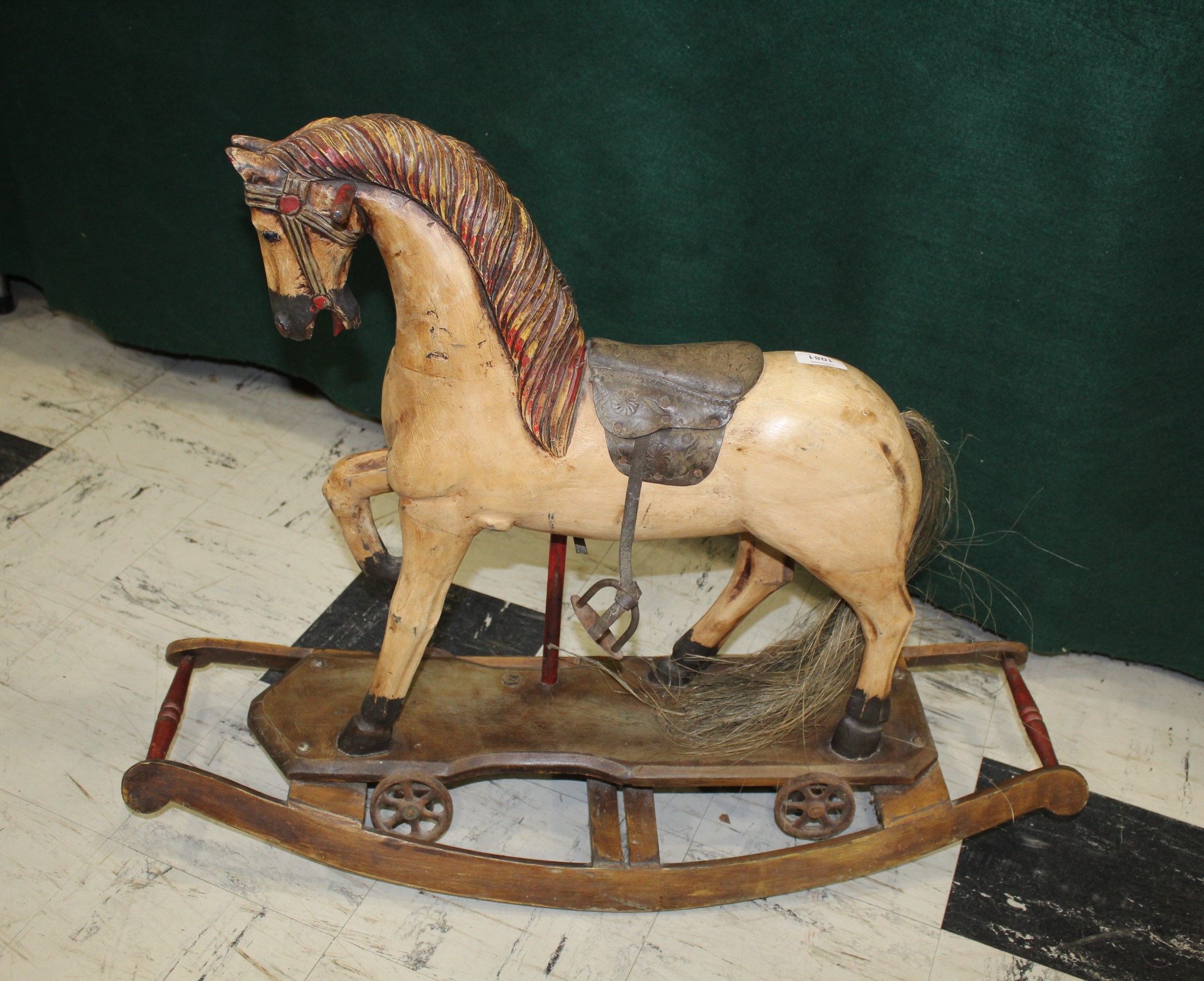 ANTIQUE ROCKING HORSE - FOLK ART INTEREST a small carved and painted wooden rocking horse, with