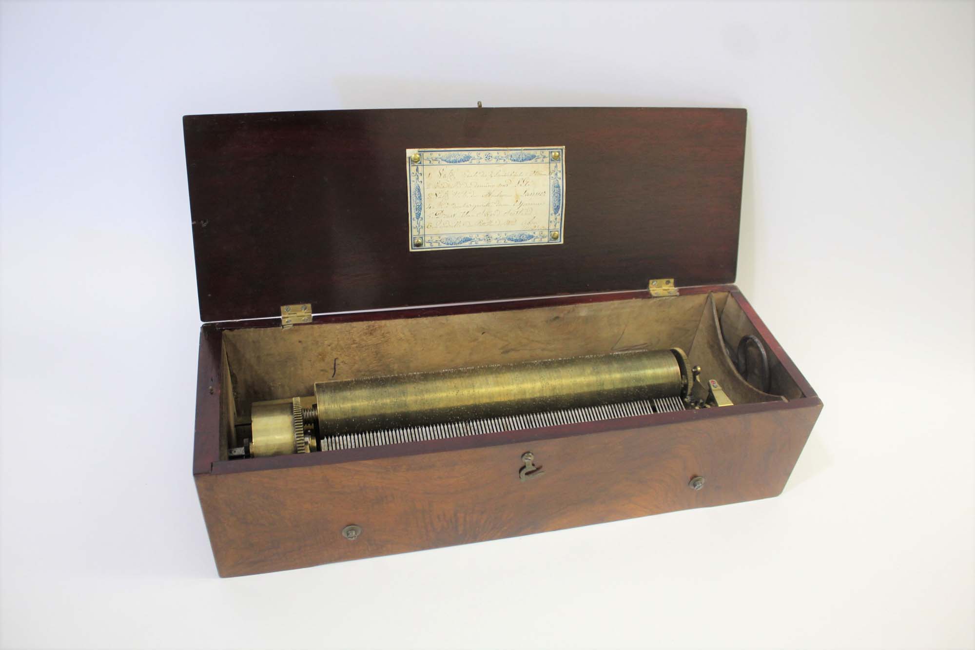 19THC MUSICAL BOX - 6 AIRS a musical box with a fold down flap on one side, to reveal 3 brass levers