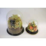 SIMULATED FRUIT & GLASS DOMES 2 large displays of simulated fruit, both with glass domes and