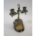 VICTORIAN MOUNTED HORSE HOOF CANDLESTICK - ARMY & NAVY a Horse's hoof with brass mounts, and