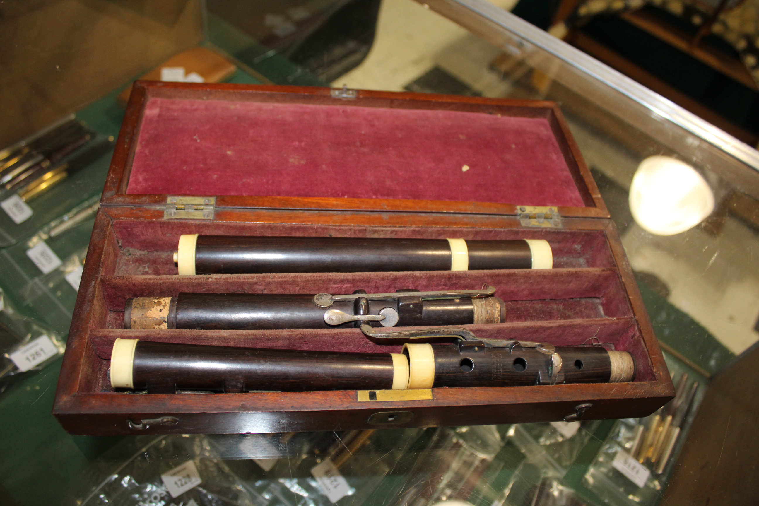 CASED 19THC FLUTE - W BARK, LONDON a 19thc rosewood flute, in four sections and with ivory joins. - Image 3 of 16