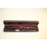 ANTIQUE FLUTE - WOOD & IVY a 3 section rosewood flute with 8 keys, marked Wood & Ivy and in a fitted
