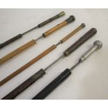 VARIOUS SWORD STICKS 5 various sword sticks, 2 with bamboo shafts, 1 with a cane shaft, and 2