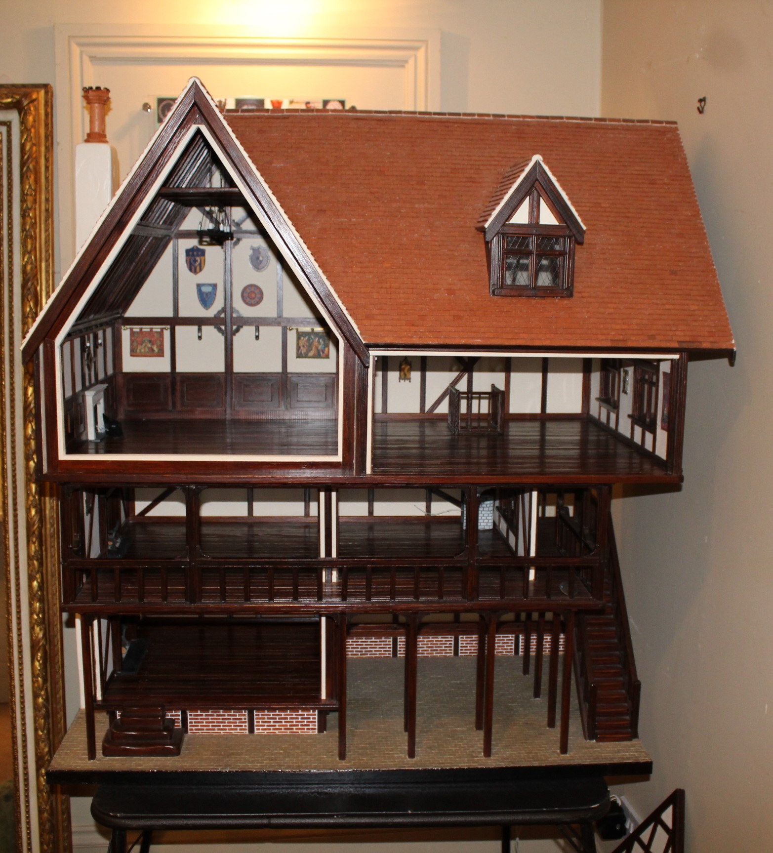 TUDOR STYLE MODERN DOLLS HOUSE & CONTENTS a modern 3 storey wooden dolls house in the Tudor style, - Image 2 of 11