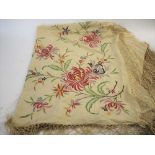 VINTAGE SHAWL an early 20thc cream silk fringed shawl, with vibrant embroidered floral design.