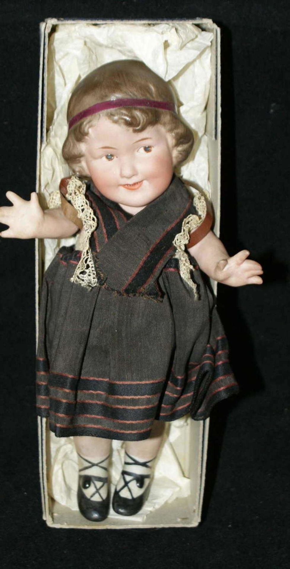 alte Porzellan Stollwerck Puppe, ca. 100 Jahre alt.Bewegliche Arme und Beine. ca. 21cm hoch old