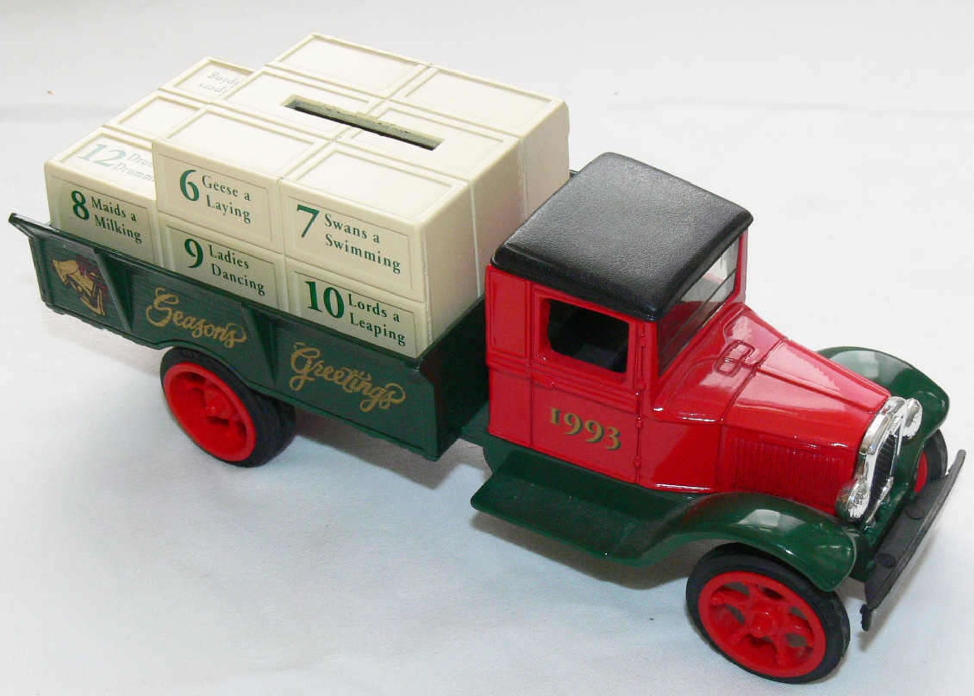 Ertl Modell - Truck Hawkeye 1931 "12 Tage bis Weihnachten". Modell 1993. Maßstab: 1:34. Ladung als