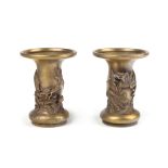 A Pair of Japanese Gilt Bronze Candlesticks