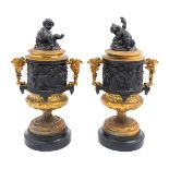 A Pair of Gilt and Patinated Cast Metal Urns