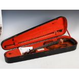 An early 19th century violin, circa 1820, 7/8 size, in fitted case with bow.