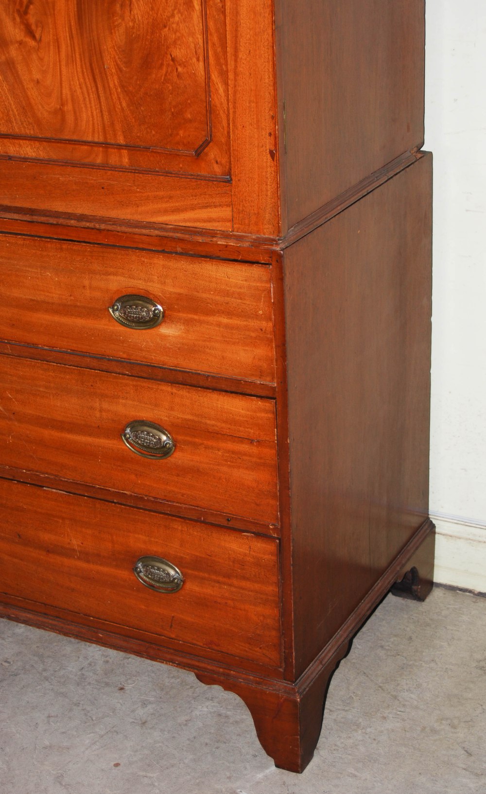 A 19th century mahogany linen press, the moulded cornice and dentil frieze above a pair of - Image 6 of 7