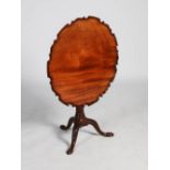 A George III style mahogany snap top occasional table, the hinged top with a pie crust edge,